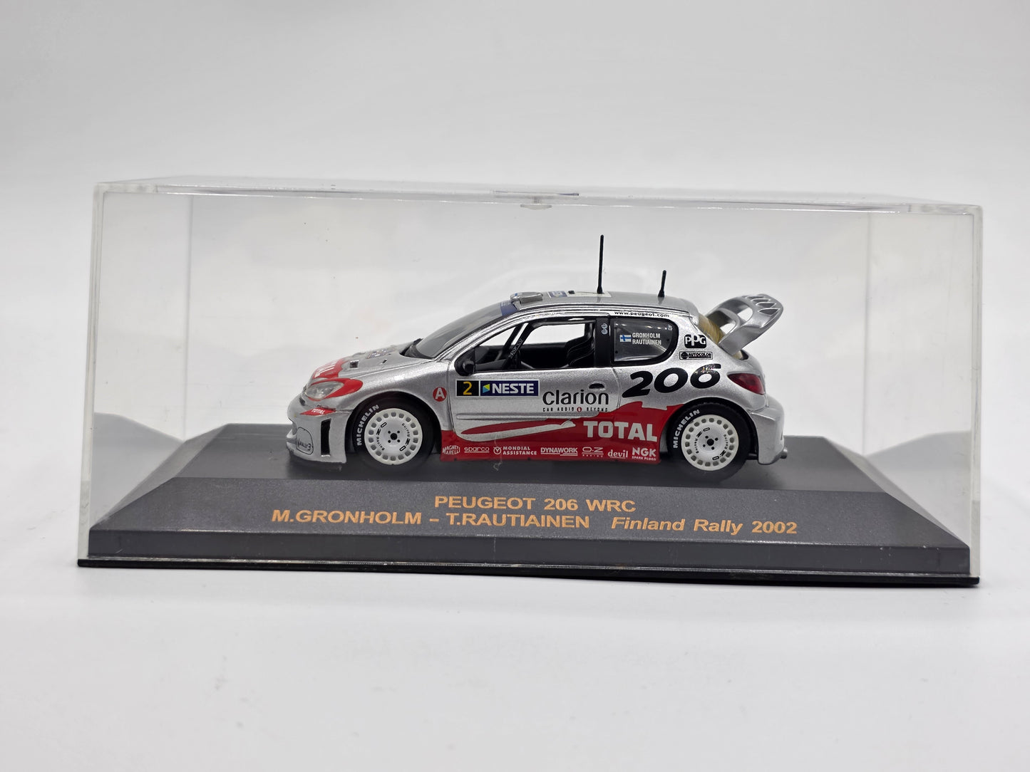1/43 2002 Peugeot 206 WRC - Finland Rally - Gronholm / Rautiainen | IXO Model Rally Car