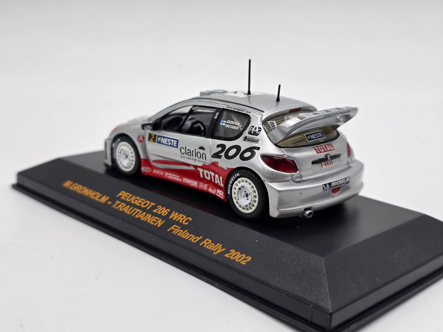 1/43 2002 Peugeot 206 WRC - Finland Rally - Gronholm / Rautiainen | IXO Model Rally Car