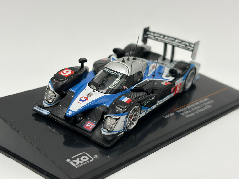 1/43 2009 Peugeot 908 HDI FAP - Brabham / Gene / Wurz - IXO | Model Le Mans Car